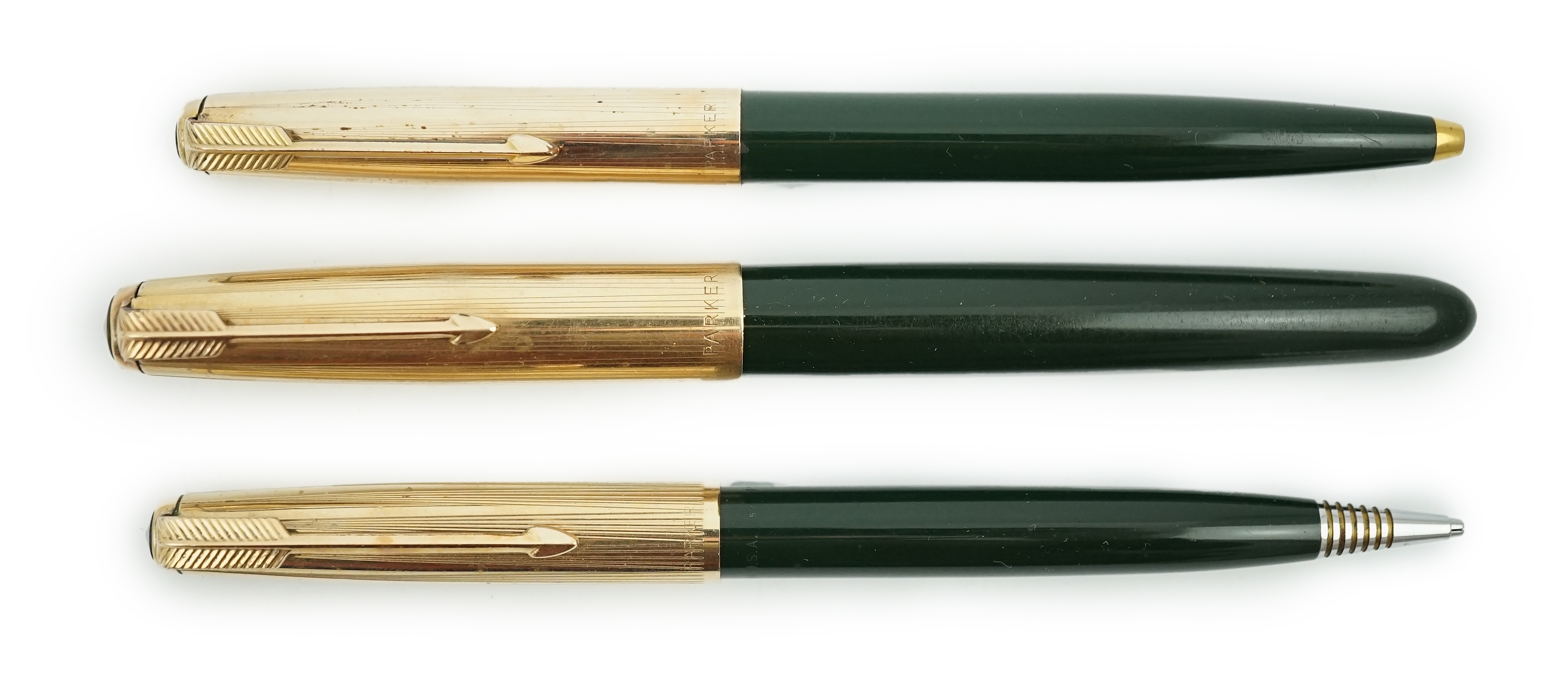 A Parker '51' Aerometric fountain pen, ball pen and pencil set in rare 'Forest Green'